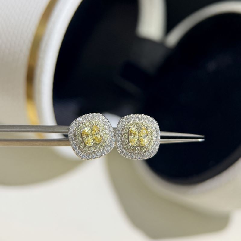 T*f*ny earrings